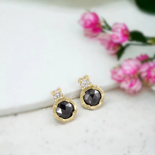 Black Diamond Solitaire Stud Earrings with Rose-Cut Diamonds featuring round rose-cut salt-and-pepper diamonds in a solitaire-inspired stud earring design with a push-back closure.