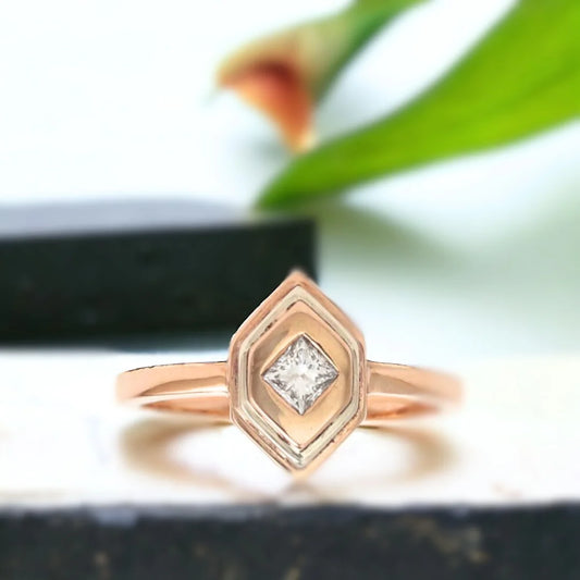 Rose Gold Geometric Diamond Ring Modern Elegant Jewelry featuring a princess-cut natural white diamond in a contemporary geometric ring design with crisp lines, a rose gold finish, and a straight shank band for a minimalist, elegant look.