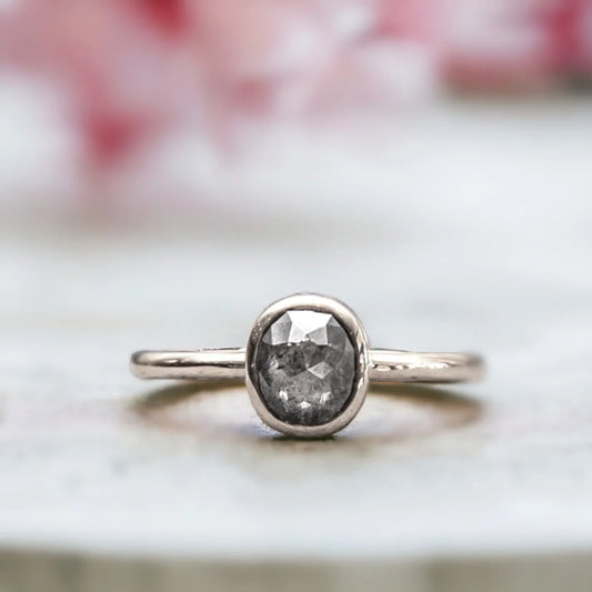 Salt and Pepper Cushion Diamond Ring Rose Gold Bezel Solitaire featuring a natural salt and pepper cushion-cut diamond set in a rose gold bezel solitaire style with a straight shank band and minimalist, elegant design