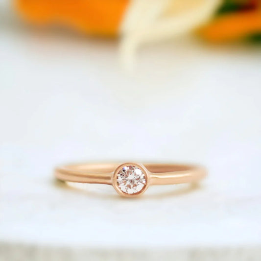 Yellow Gold Diamond Solitaire Ring Minimalist 0.55 CT White Diamond featuring a round brilliant-cut white diamond set in polished yellow gold with a slim band and clean, straight shank solitaire design