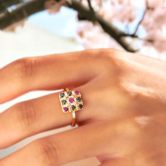 XO Black Diamond and Pink Ruby Ring with White Diamonds