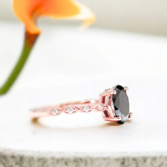 Oval Black Diamond Engagement Ring with Marquise Accents