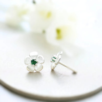 Sterling Silver Floral Stud Earrings with Green Emerald