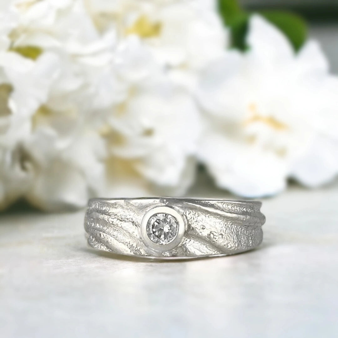 Telesto Ring with Bezel Set Round Diamond