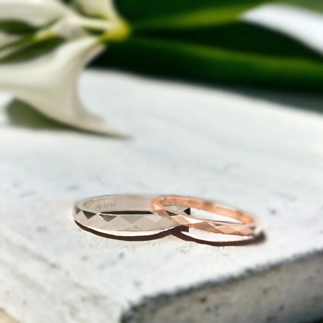 Faceted Gold Wedding Ring with Reflective Design