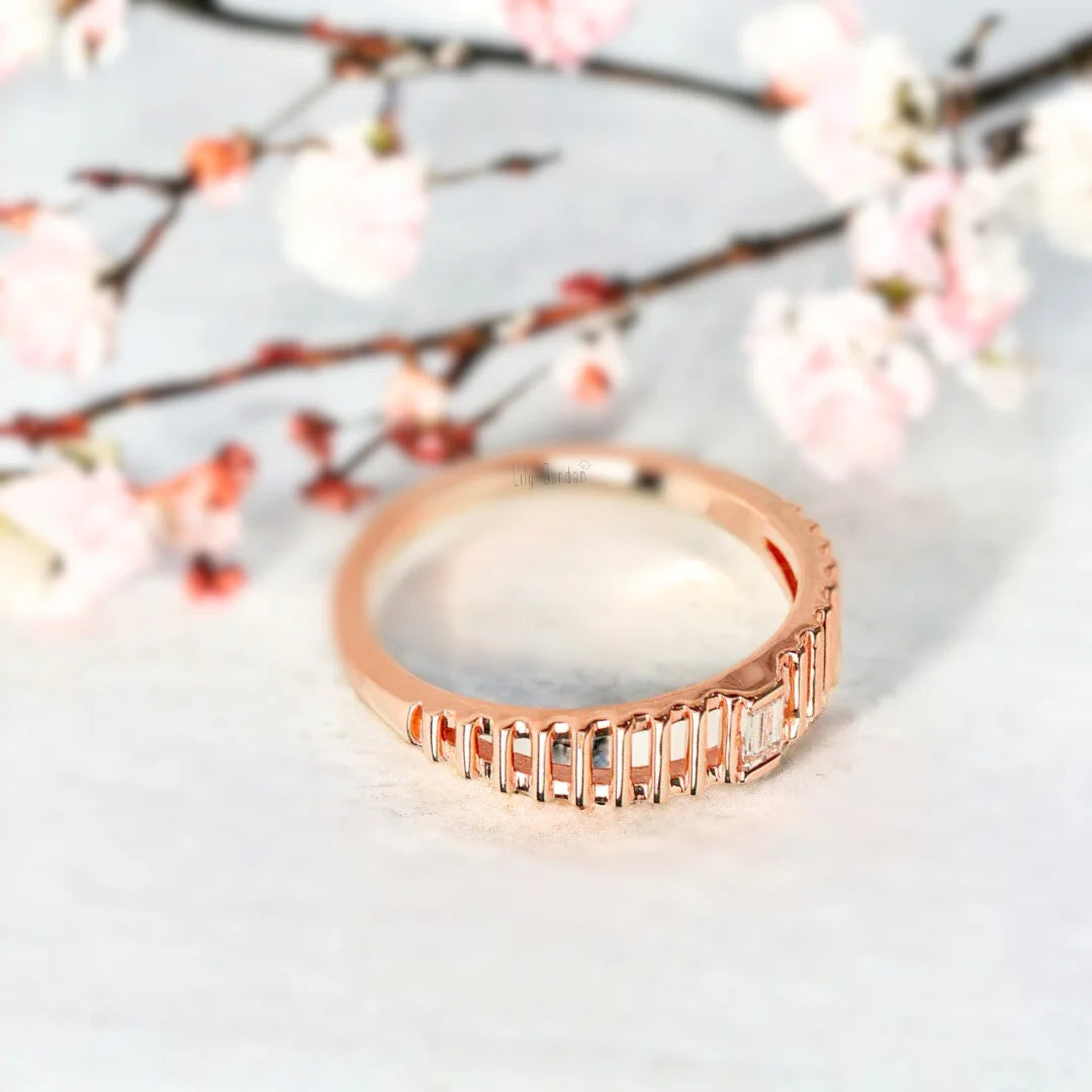 Baguette Diamond Ring in a Bold Dome Cage Design in Solid Gold featuring a natural white diamond center stone, baguette-cut diamond accents, dome-style setting, and a wide, structured band with a modern geometric design.