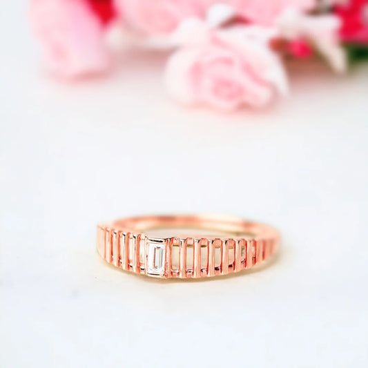 Baguette Diamond Ring in a Bold Dome Cage Design in Solid Gold featuring a natural white diamond center stone, baguette-cut diamond accents, dome-style setting, and a wide, structured band with a modern geometric design.