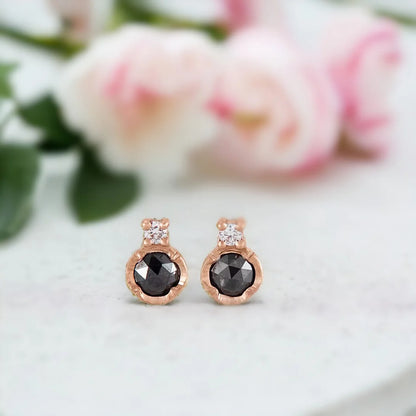 Black Diamond Solitaire Stud Earrings with Rose-Cut Diamonds featuring round rose-cut salt-and-pepper diamonds in a solitaire-inspired stud earring design with a push-back closure.