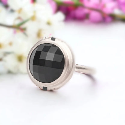 Black Salt and Pepper Diamond Ring Round Chex Cut Vintage Gold Ring featuring a round chex-cut black salt and pepper diamond center stone in vintage gold style with a straight shank band and minimal contemporary geometric design appeal.