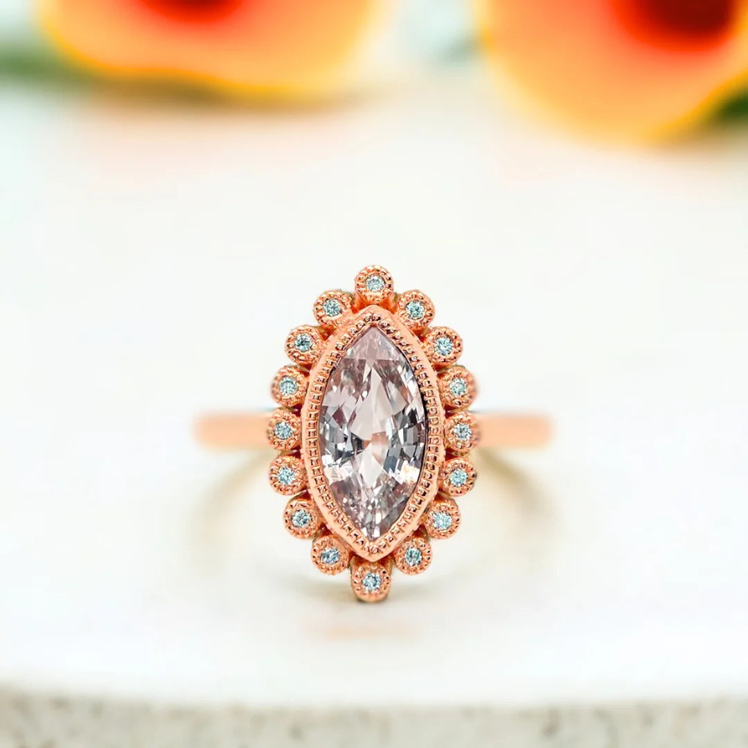 Blue Sapphire Ring Oceanic Elegance Marquise Design featuring a natural marquise-cut deep ocean blue sapphire center stone with a slim straight band and delicate blue sapphire side stones in a handcrafted fine jewelry ring
