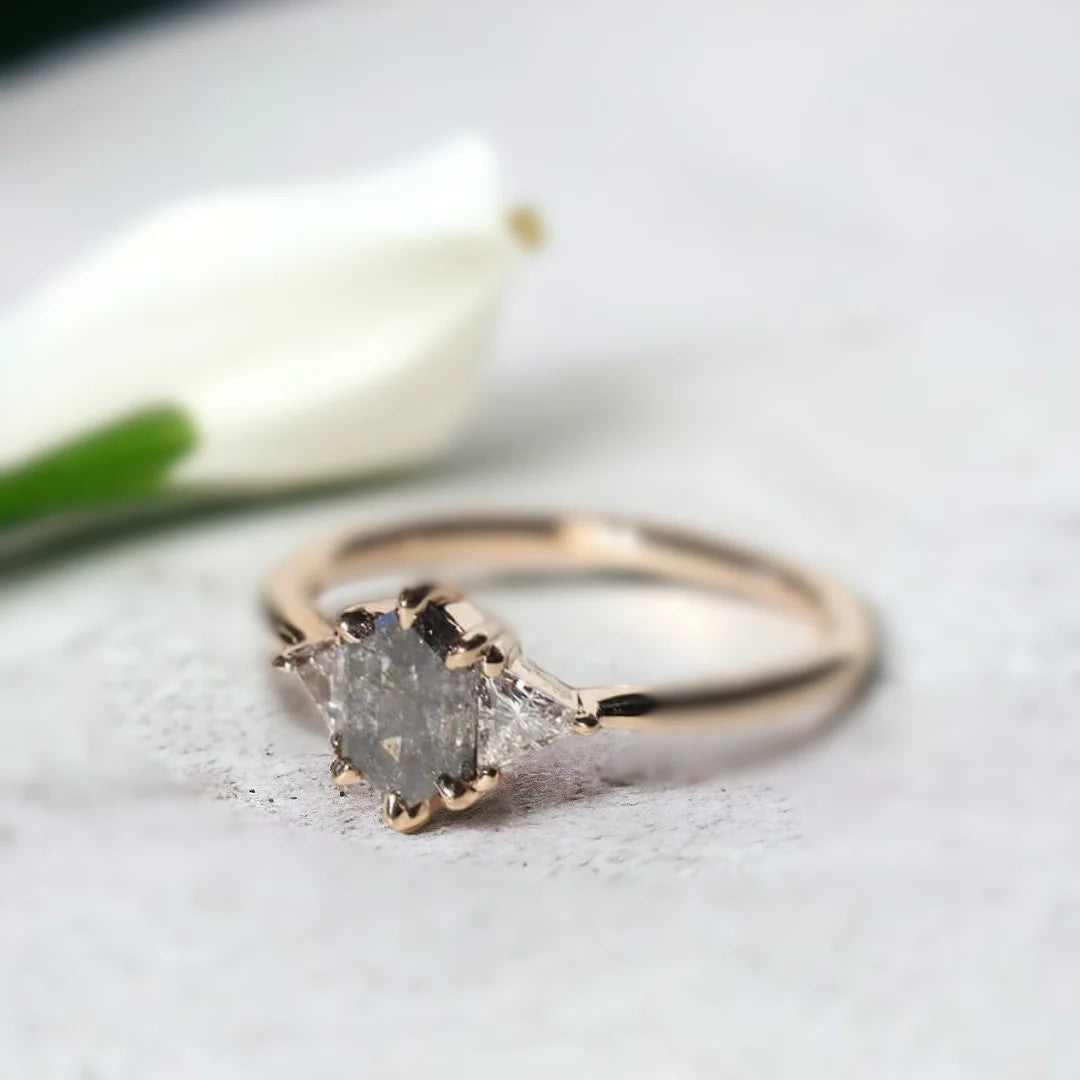 Brooklyn Wedding Rings Custom Salt and Pepper Diamond Ring featuring a hexagon-cut salt-and-pepper diamond center stone with trillion-cut side diamonds in a geometric side stone ring design and straight shank setting.