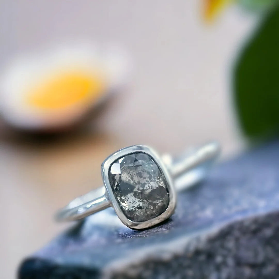 Cushion Rose Cut Salt and Pepper Diamond Ring Vintage Design featuring a 0.95 CT rose cushion cut natural salt and pepper diamond in a solitaire setting with a straight shank and an elegant vintage-inspired ring design.