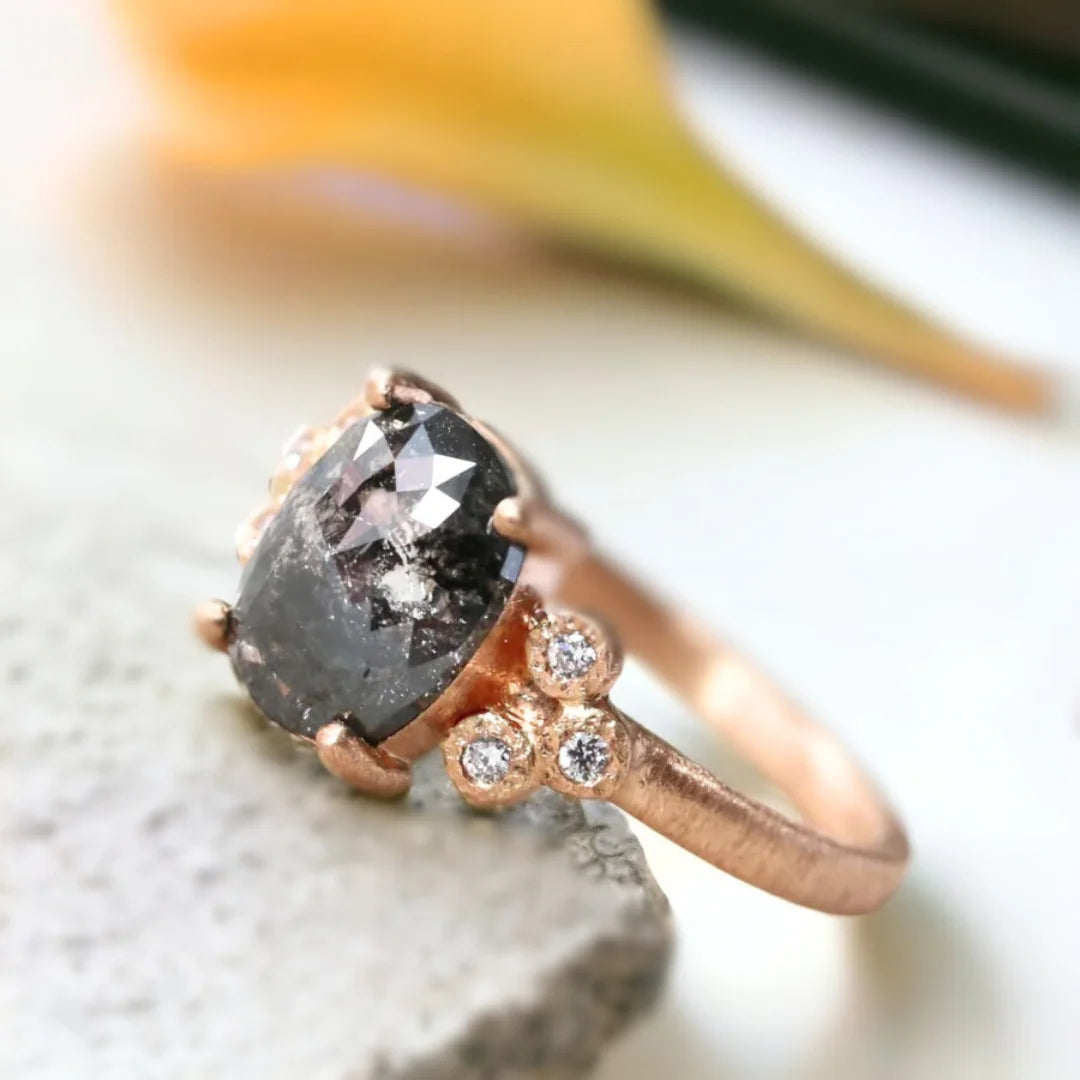Elongated Cushion Salt-and-Pepper Diamond Ring Crystal Clarity Design featuring a rose elongated cushion-cut salt-and-pepper diamond with a 2.04 CT center stone, round side diamonds, and a straight band design in a refined engagement ring style.
