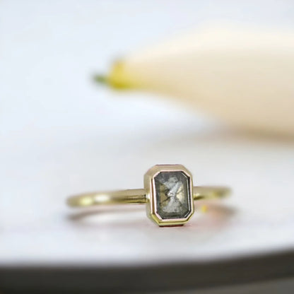 Emerald Cut Salt and Pepper Diamond Ring Pavé Fine Jewellery Ring featuring an emerald cut salt and pepper diamond set in a minimalist pavé fine jewellery ring design with a slim straight band and clean modern silhouette highlighting natural inclusions and refined elegance.