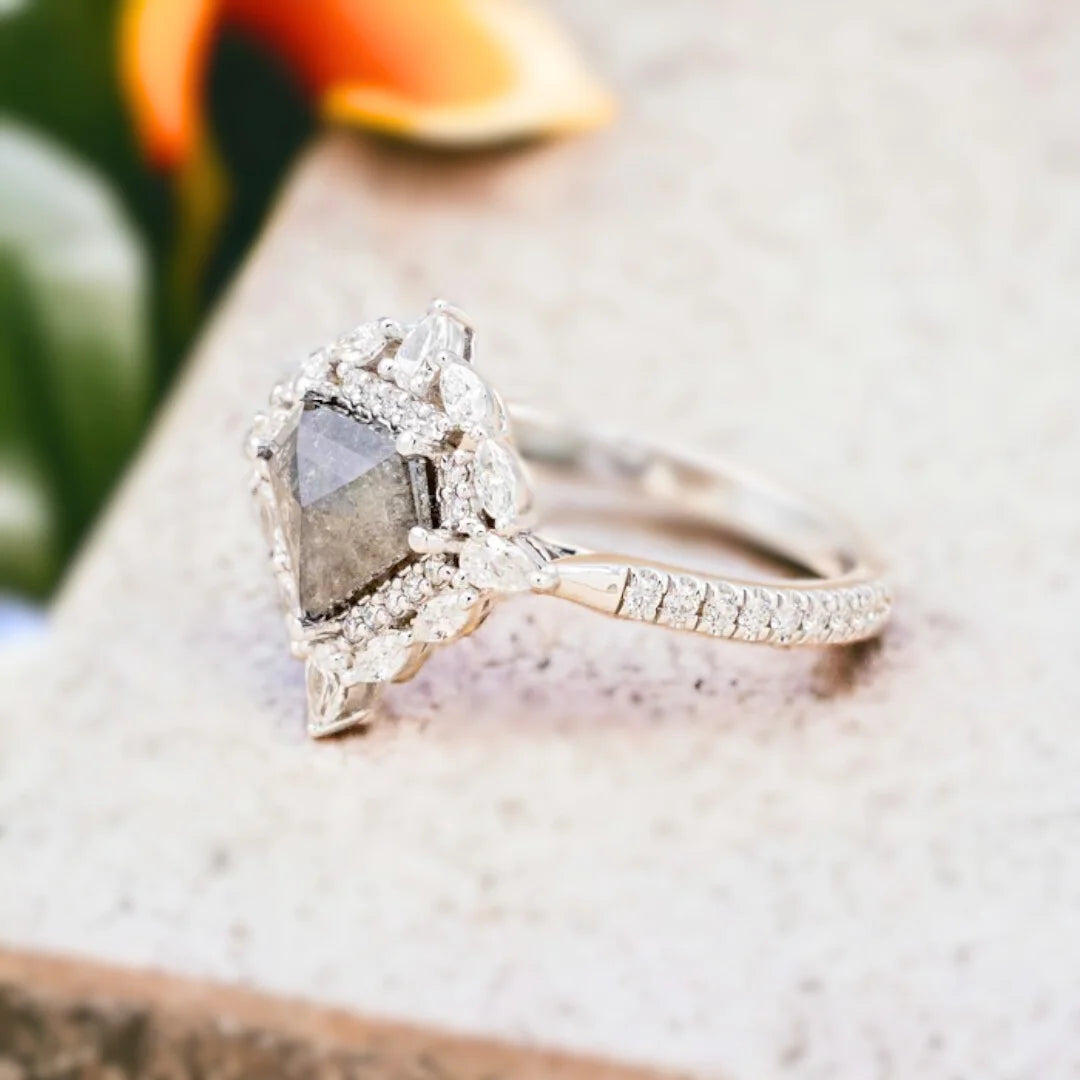 Fabled Diamond Ring Fiery Fantasia Filigree Forever Flourish 1.70 Ct featuring a shield-cut natural salt-and-pepper diamond with visible black and white inclusions, set in a filigree-inspired modern engagement ring design with natural side diamonds, straight shank band, and structured yet decorative geometric styling.