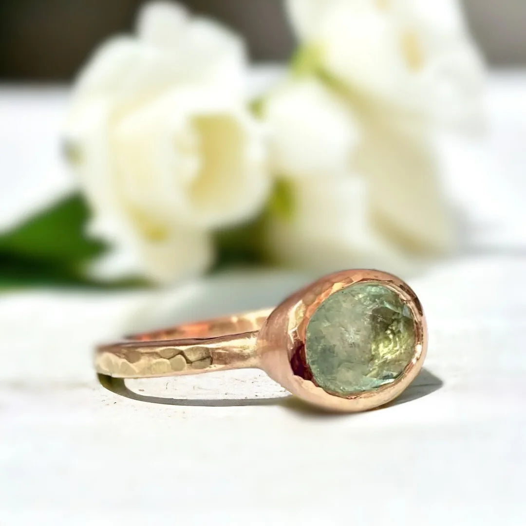 Green Tourmaline Ring with 2.25 CT oval-cut natural gemstone featuring a rose oval-cut green tourmaline set in a minimalist straight shank design with a slim 1.90mm band and vintage-inspired faceting.