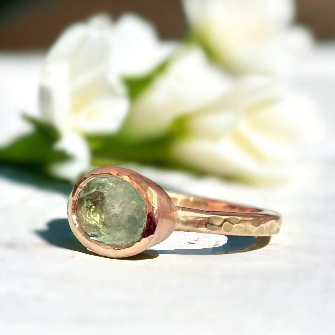 Green Tourmaline Ring with 2.25 CT oval-cut natural gemstone featuring a rose oval-cut green tourmaline set in a minimalist straight shank design with a slim 1.90mm band and vintage-inspired faceting.