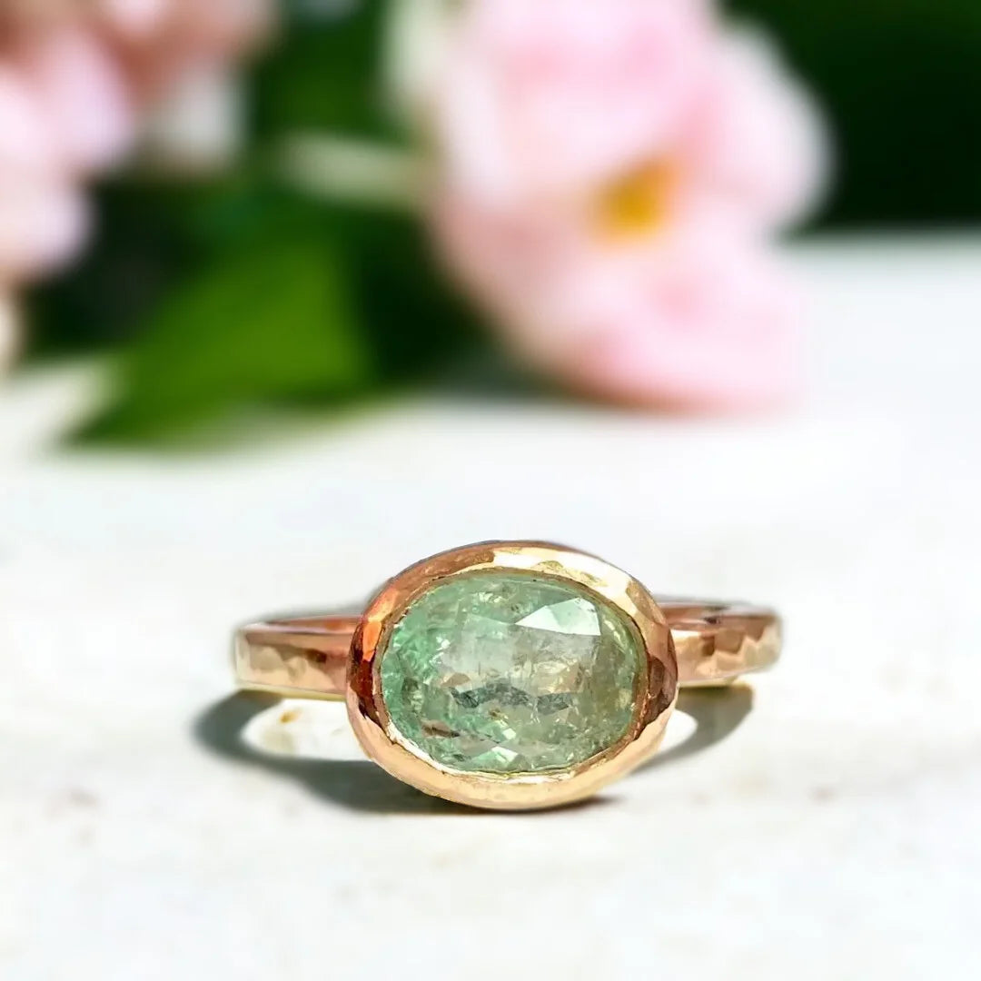 Green Tourmaline Ring with 2.25 CT oval-cut natural gemstone featuring a rose oval-cut green tourmaline set in a minimalist straight shank design with a slim 1.90mm band and vintage-inspired faceting.