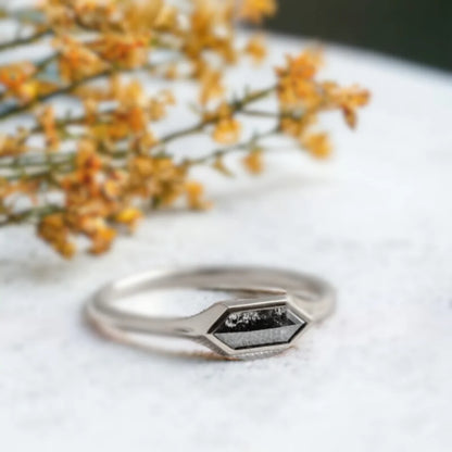 Hexagon Salt And Pepper Diamond Engagement Ring In Silver featuring a natural hexagon cut salt and pepper diamond in a sleek silver engagement ring with a modern minimalist design.