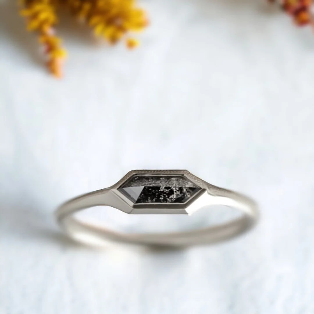Hexagon Salt And Pepper Diamond Engagement Ring In Silver featuring a natural hexagon cut salt and pepper diamond in a sleek silver engagement ring with a modern minimalist design.