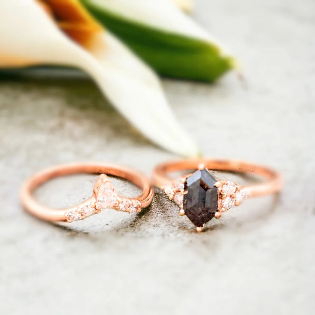 Hexagon Salt and Pepper Diamond Ring 1.90 Ct Luxury Minimalist Design featuring a hexagon-cut salt-and-pepper diamond as the center stone with natural black and white inclusions, accented by round side diamonds set along a sleek straight shank band in a modern minimalist geometric engagement ring style with clean structured symmetry and refined handcrafted detailing.