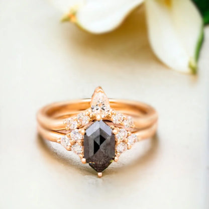 Hexagon Salt and Pepper Diamond Ring 1.90 Ct Luxury Minimalist Design featuring a hexagon-cut salt-and-pepper diamond as the center stone with natural black and white inclusions, accented by round side diamonds set along a sleek straight shank band in a modern minimalist geometric engagement ring style with clean structured symmetry and refined handcrafted detailing.