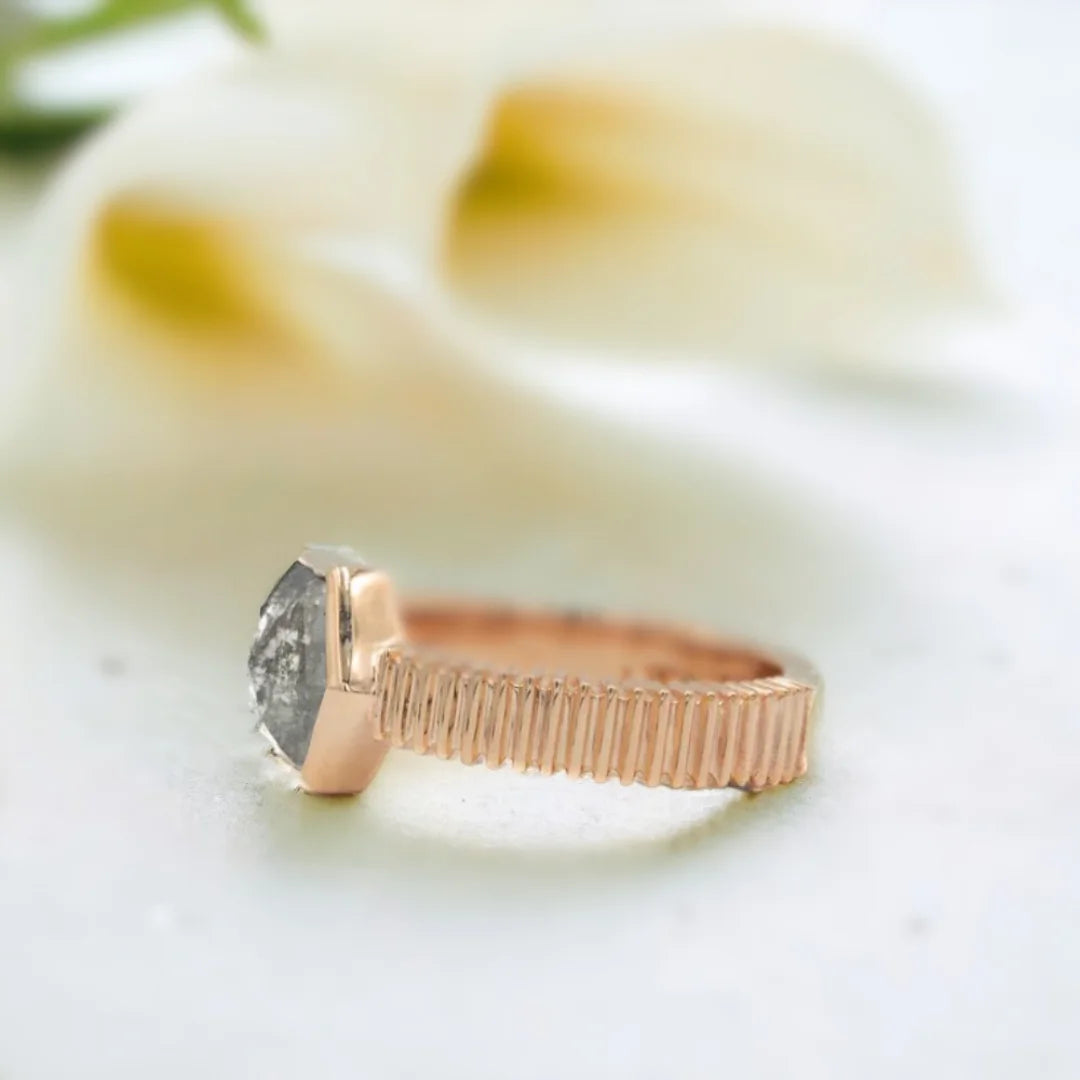 Hexagon Diamond Ring Bezel-set hexagon diamond solitaire ring featuring a hexagon-cut 1.78 CT salt-and-pepper diamond in a bezel setting with a solid gold 4.00mm wide textured band and minimalist straight shank design