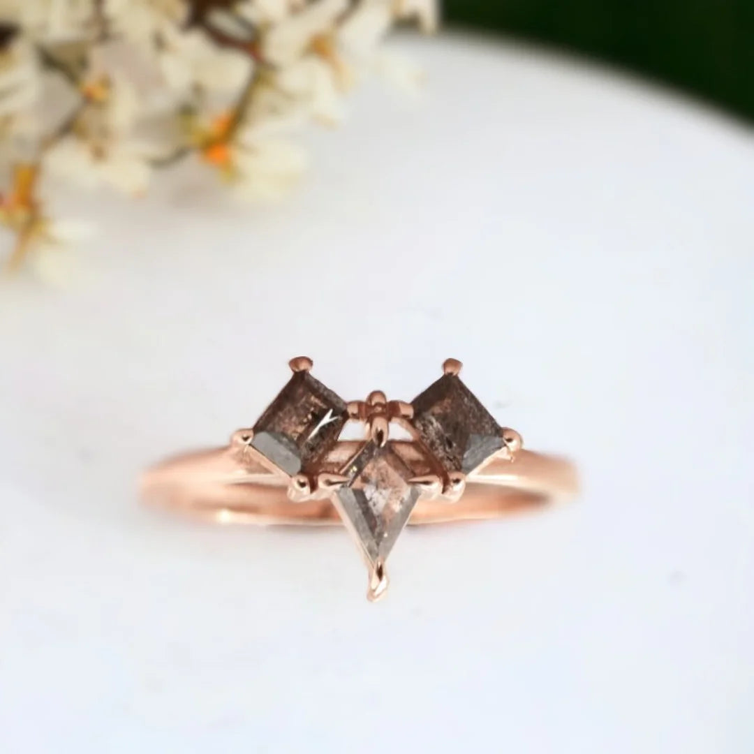 Kite Salt and Pepper Diamond Ring with Grey Baguette Accents featuring a kite-cut natural salt and pepper diamond with grey baguette side diamonds in a handcrafted three-stone ring design with a straight shank and geometric modern style.
