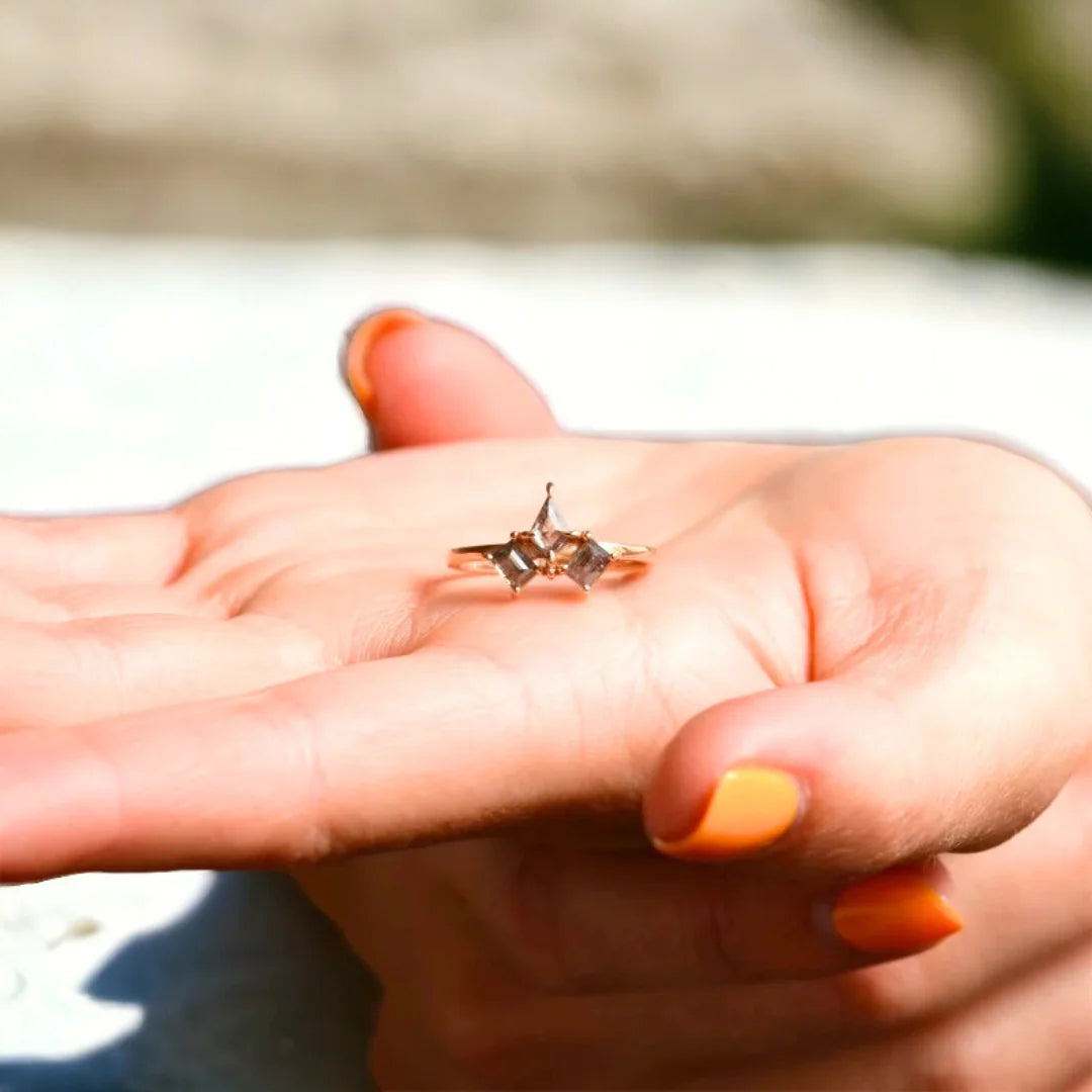 Kite Salt and Pepper Diamond Ring with Grey Baguette Accents featuring a kite-cut natural salt and pepper diamond with grey baguette side diamonds in a handcrafted three-stone ring design with a straight shank and geometric modern style.