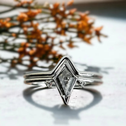 Kite Salt and Pepper Diamond Ring with Grey Side Stones featuring a 0.72 CT kite-cut natural salt-and-pepper diamond with grey round side diamonds in a geometric side stone engagement ring design.