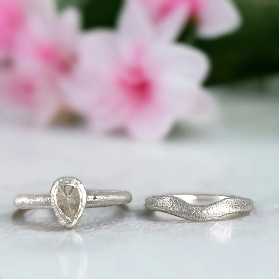 Lab-Grown Salt-and-Pepper Diamond Ring Custom Thalia Gemstone Band featuring a lab-grown salt-and-pepper diamond ring with pear-shaped centre stone, straight shank design, and 2.30mm artisan-crafted band with organic minimalist detailing