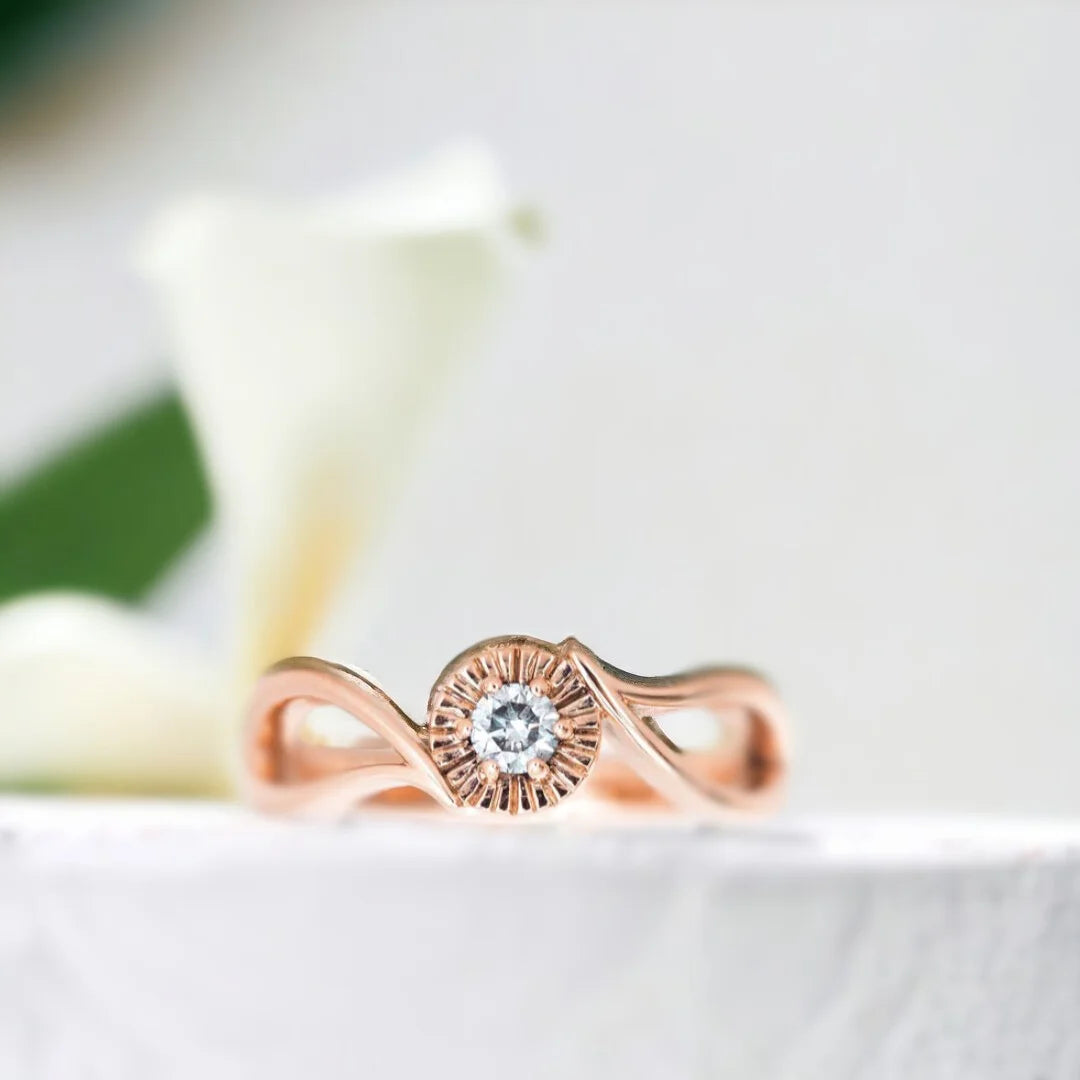 Leaf-inspired Round Diamond Nature Engagement Ring Salt Pepper Stone featuring a round salt-and-pepper diamond in a nature-inspired bypass setting with an organic flowing design and tapered band.