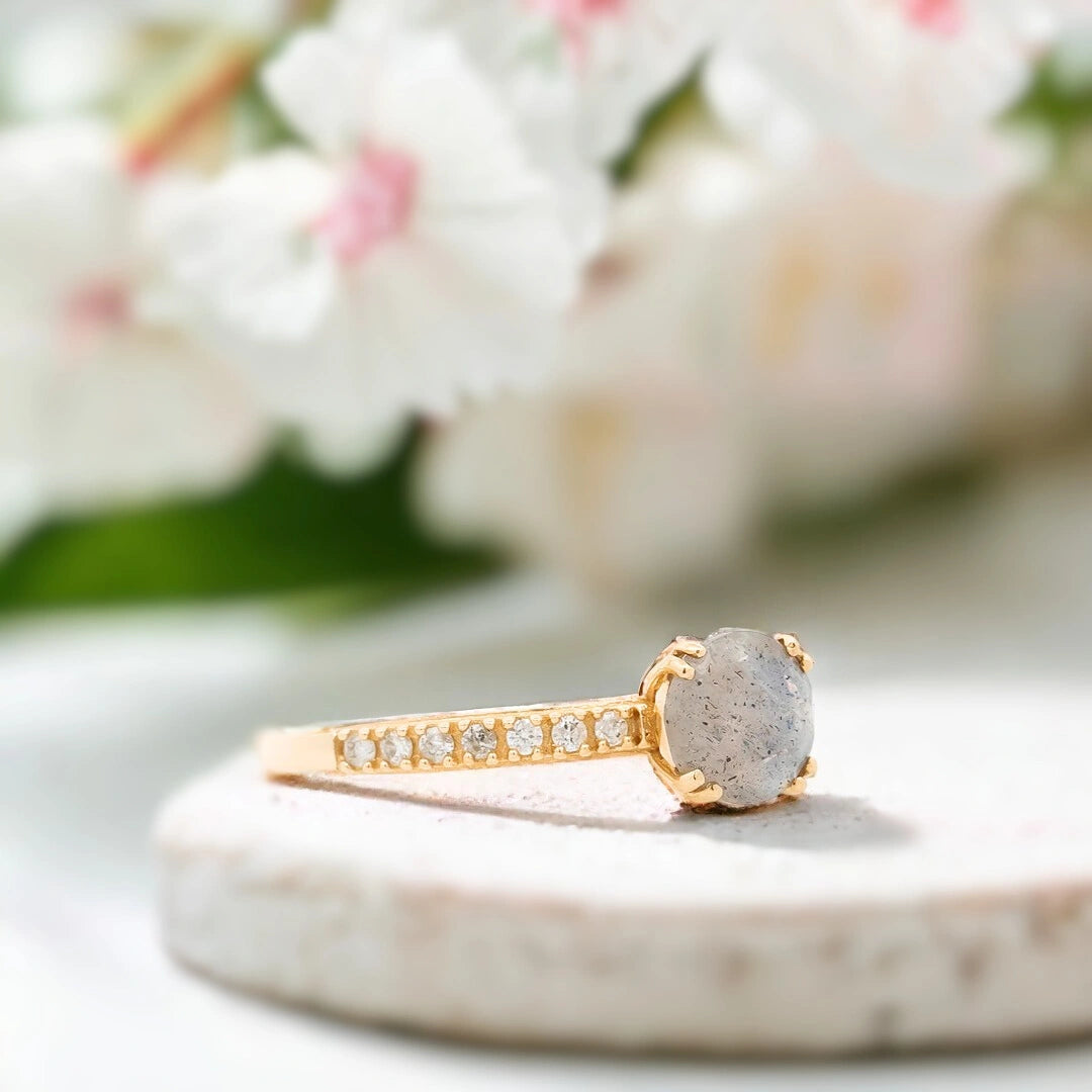 Salt and Pepper Diamond Ring Milky Way in Yellow Gold featuring a round-cut salt-and-pepper diamond with a milky grey tone and cosmic-inspired inclusions set in a yellow gold band with pavé diamond detailing in a handcrafted modern engagement ring design