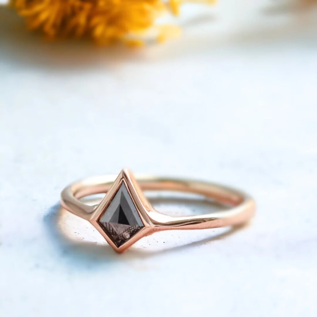 Minimalist Salt and Pepper Diamond Promise Ring featuring a kite-cut salt-and-pepper diamond set in a clean, minimalist band design with a slim straight shank and subtle modern handcrafted finish.