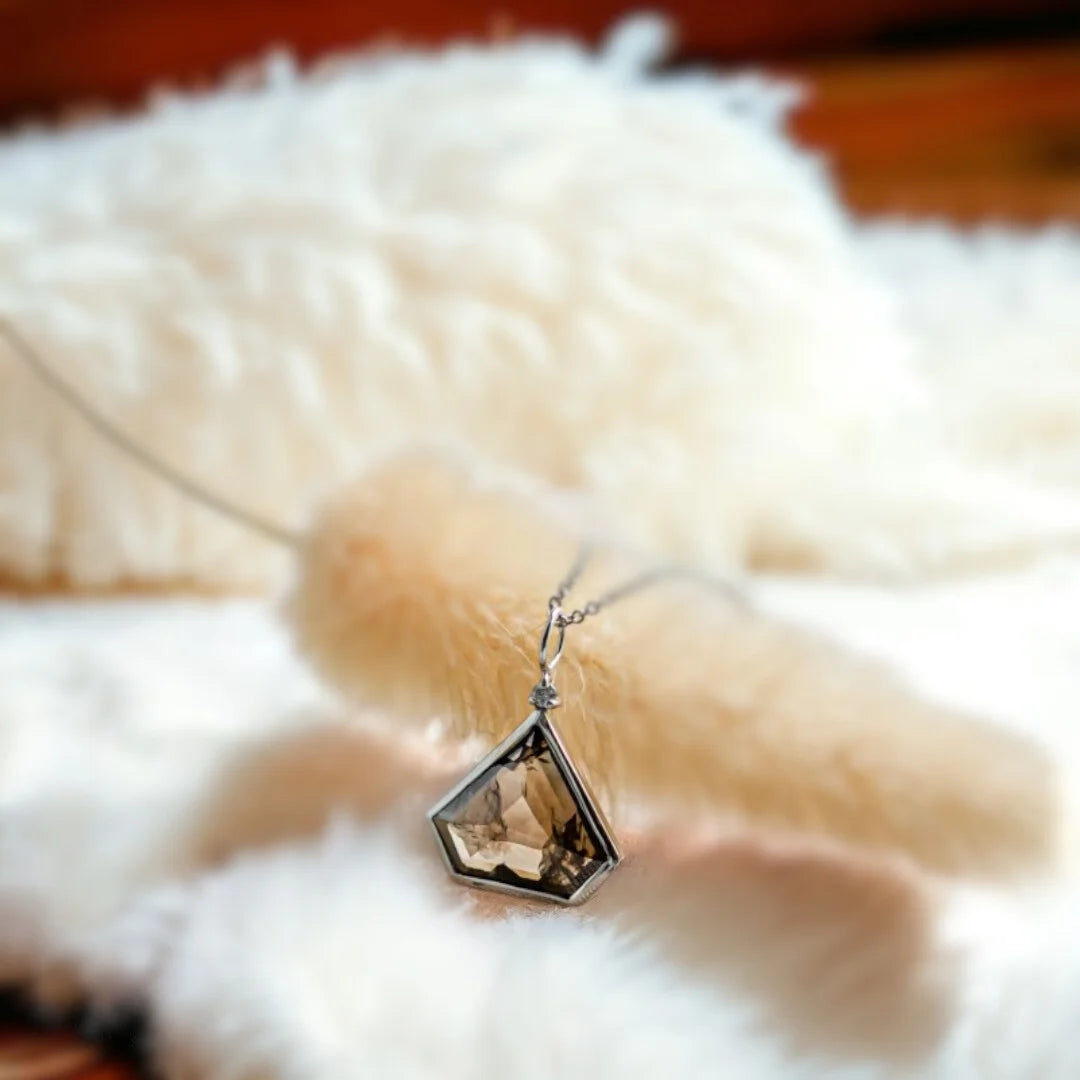 Natural Brown Salt and Pepper Diamond Necklace Grace Cut Pendant featuring a natural brown salt and pepper diamond in a Grace cut shape, displayed as a minimalist geometric pendant necklace with a distinctive organic inclusion pattern and modern fine jewelry styling.