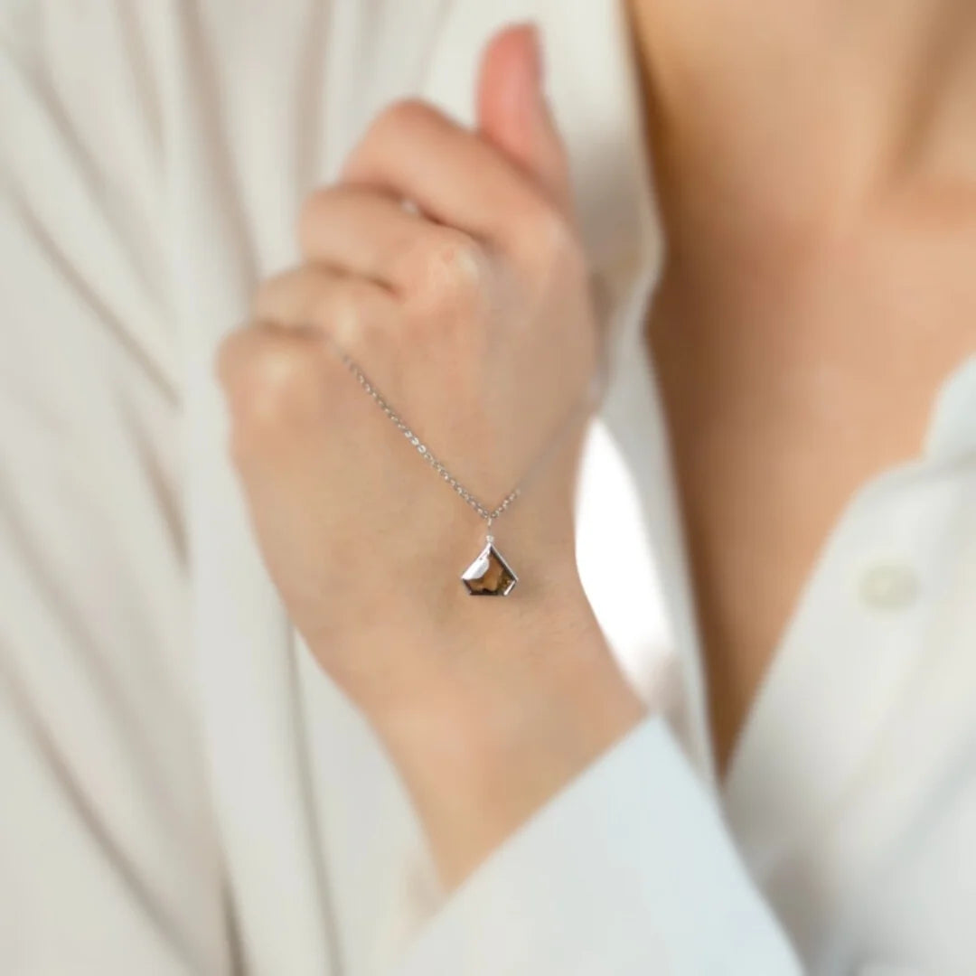 Natural Brown Salt and Pepper Diamond Necklace Grace Cut Pendant featuring a natural brown salt and pepper diamond in a Grace cut shape, displayed as a minimalist geometric pendant necklace with a distinctive organic inclusion pattern and modern fine jewelry styling.