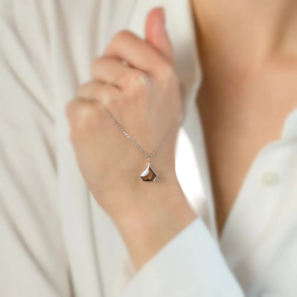 Natural Brown Salt and Pepper Diamond Necklace Grace Cut Pendant featuring a natural brown salt and pepper diamond in a Grace cut shape, displayed as a minimalist geometric pendant necklace with a distinctive organic inclusion pattern and modern fine jewelry styling.