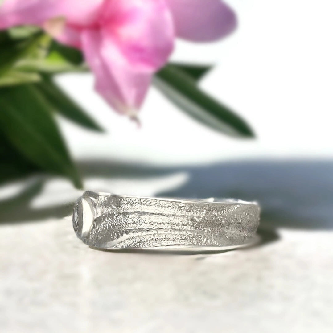 Natural Diamond Ring Telesto Bezel Set Round Diamond Statement Ring featuring a natural round diamond with classic brilliance and refined sparkle, 4.80mm centre stone in a secure bezel setting, H colour, SI3 clarity, and a bold 7.10mm handcrafted band with straight shank design and smooth modern finish.