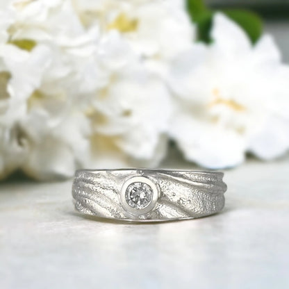 Natural Diamond Ring Telesto Bezel Set Round Diamond Statement Ring featuring a natural round diamond with classic brilliance and refined sparkle, 4.80mm centre stone in a secure bezel setting, H colour, SI3 clarity, and a bold 7.10mm handcrafted band with straight shank design and smooth modern finish.