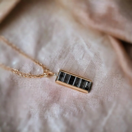 Natural Salt And Pepper Diamond Necklace Baguette Cut Pendant featuring a natural salt and pepper diamond in a baguette cut shape, showcased as a minimalist pendant necklace with organic diamond inclusions, clean geometric lines, and modern fine jewelry styling.