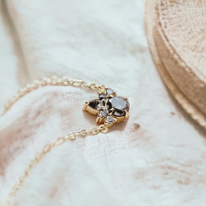 Natural Salt And Pepper Diamond Necklace Mixed Diamond Pendant featuring five round salt and pepper diamonds and one pear shaped diamond in a mixed shape pendant design suspended from a delicate chain with a modern minimalist jewelry style.