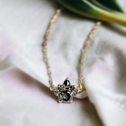 Natural Salt And Pepper Diamond Necklace Mixed Diamond Pendant featuring five round salt and pepper diamonds and one pear shaped diamond in a mixed shape pendant design suspended from a delicate chain with a modern minimalist jewelry style.