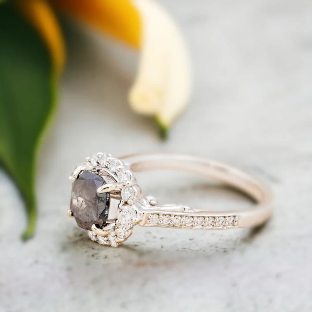 Natural Salt and Pepper Diamond Ring Cushion Cut 2 Ct Elegant featuring a cushion-cut salt-and-pepper diamond as the center stone with round diamond side accents, set in a straight shank engagement ring design with a modern, elegant handcrafted finish and subtle sparkling contrast along the band.