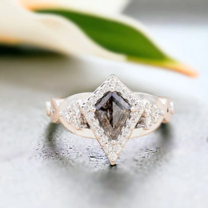 Natural Salt and Pepper Diamond Ring Kite Diamond Handmade Ring Design showcasing a kite-cut salt-and-pepper diamond at the center, accented by round side diamonds with fine pavé-style detailing, set in a modern geometric handcrafted engagement ring with a sculptural diamond accent design and a refined freedom shank band.