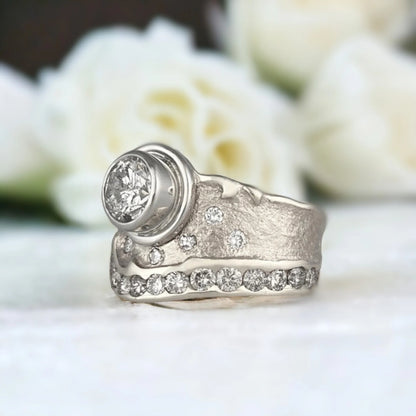Natural Salt and Pepper Diamond Ring, Nature-Inspired Swirl Design featuring a 1.03 CT round salt and pepper diamond centre stone with galaxy-like inclusions, wide sculptural 11.00mm handcrafted band, round side stones, and a modern organic swirl style setting.