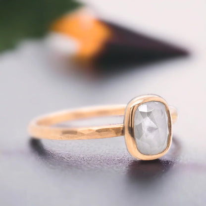 Natural Salt and Pepper Diamond Ring with Rose Cushion Cut Design featuring a cushion-cut salt-and-pepper diamond set in a straight band ring with a minimal handcrafted fine jewellery style and a soft, elegant silhouette.