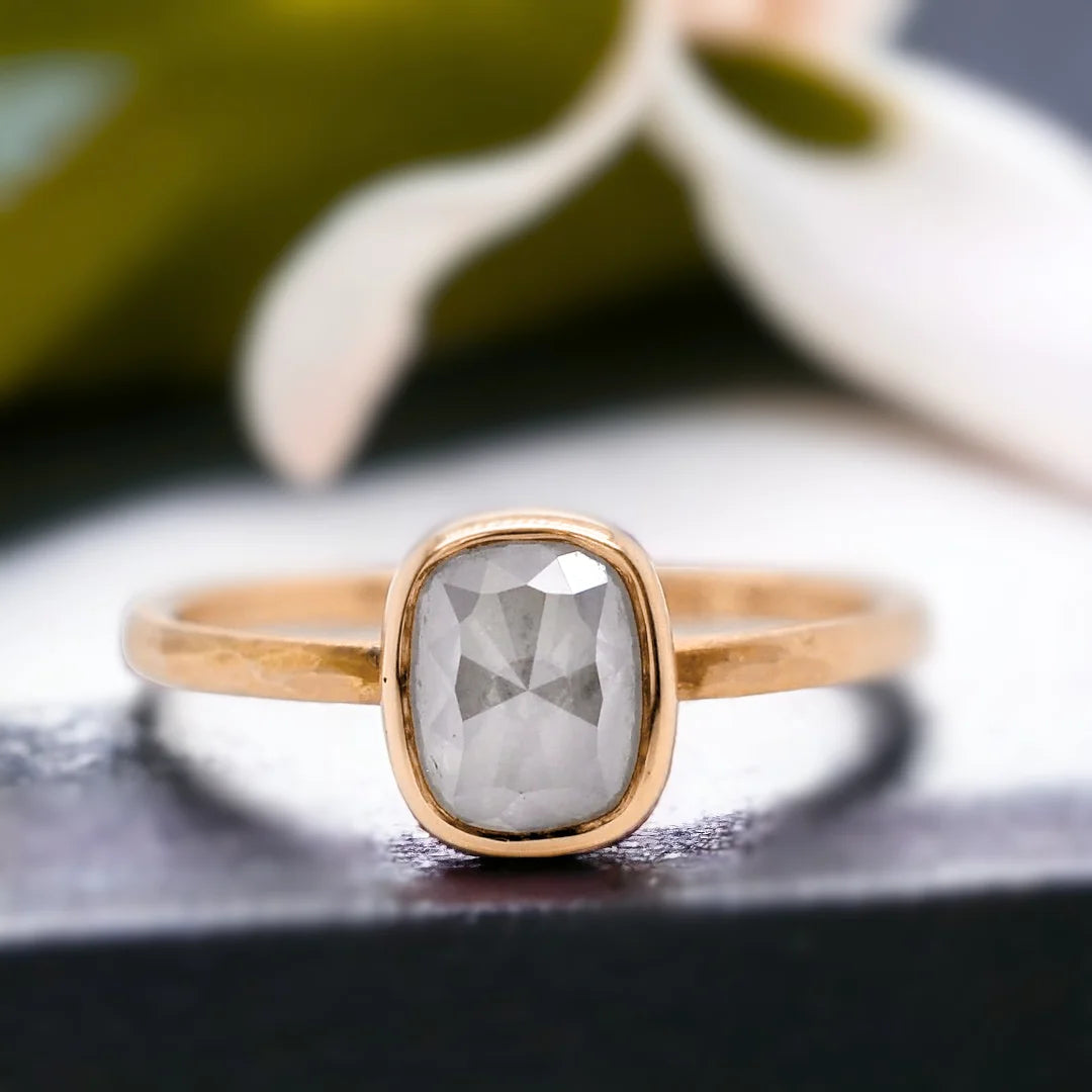 Natural Salt and Pepper Diamond Ring with Rose Cushion Cut Design featuring a cushion-cut salt-and-pepper diamond set in a straight band ring with a minimal handcrafted fine jewellery style and a soft, elegant silhouette.