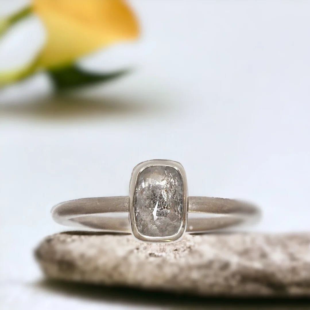 Natural Salt and Pepper Diamond Ring, Ice White Diamond Ring In Gray Gold, featuring a 1.05 CT rose cushion-cut natural salt and pepper diamond in a handcrafted artisan ring design with a straight shank band.