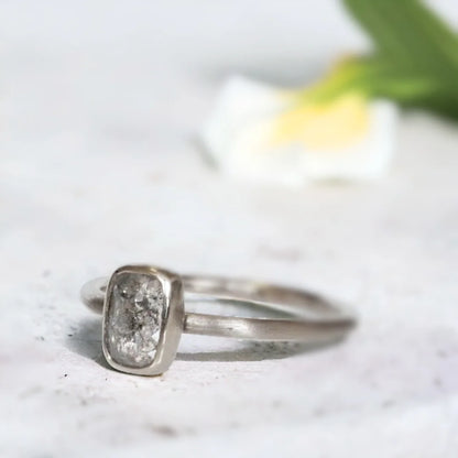 Natural Salt and Pepper Diamond Ring, Ice White Diamond Ring In Gray Gold, featuring a 1.05 CT rose cushion-cut natural salt and pepper diamond in a handcrafted artisan ring design with a straight shank band.