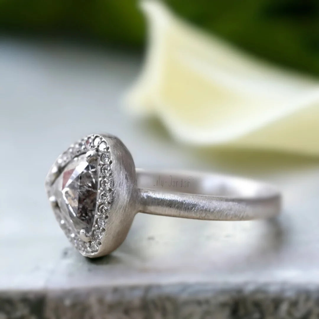 Natural Salt and Pepper Diamond Ring Triangle Cut Halo Design featuring a rose pear-cut salt and pepper diamond surrounded by a round diamond halo in a nature-inspired halo ring design with a straight shank and artisan handcrafted styling.